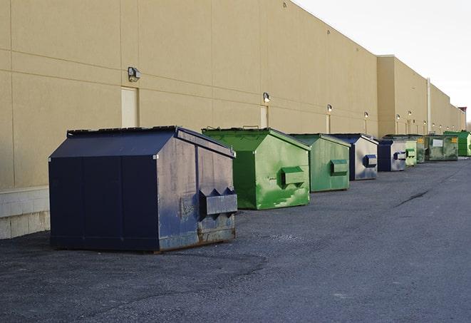 dumpsters lined up for use on busy construction site in Friendswood, TX